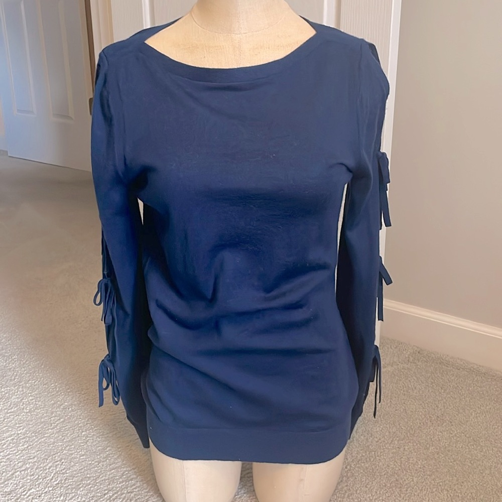 Navy blue sweater with peek a boo tie sleeves